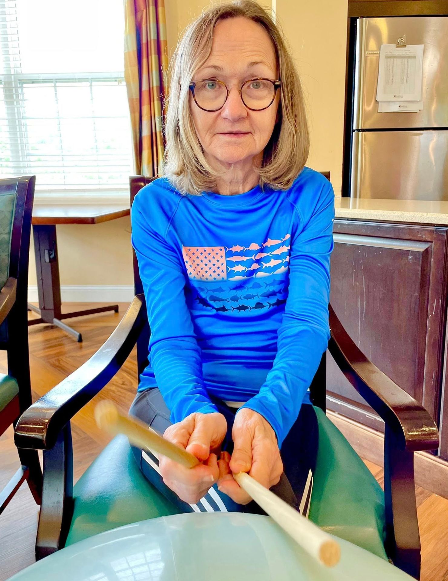 Senior resident playing drums
